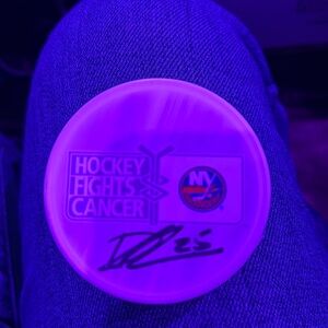 DENNIS CHOLOWSKI SIGNED HOCKEY PUCK. Islanders player #25 !